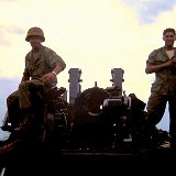 "ABtry 6/27th Arty Uknown Soldier on 8 inch Howitzer - Quan Loi - April 1968"